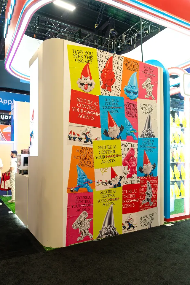 Portrait of the poster corner beside a lit gnome shelving column