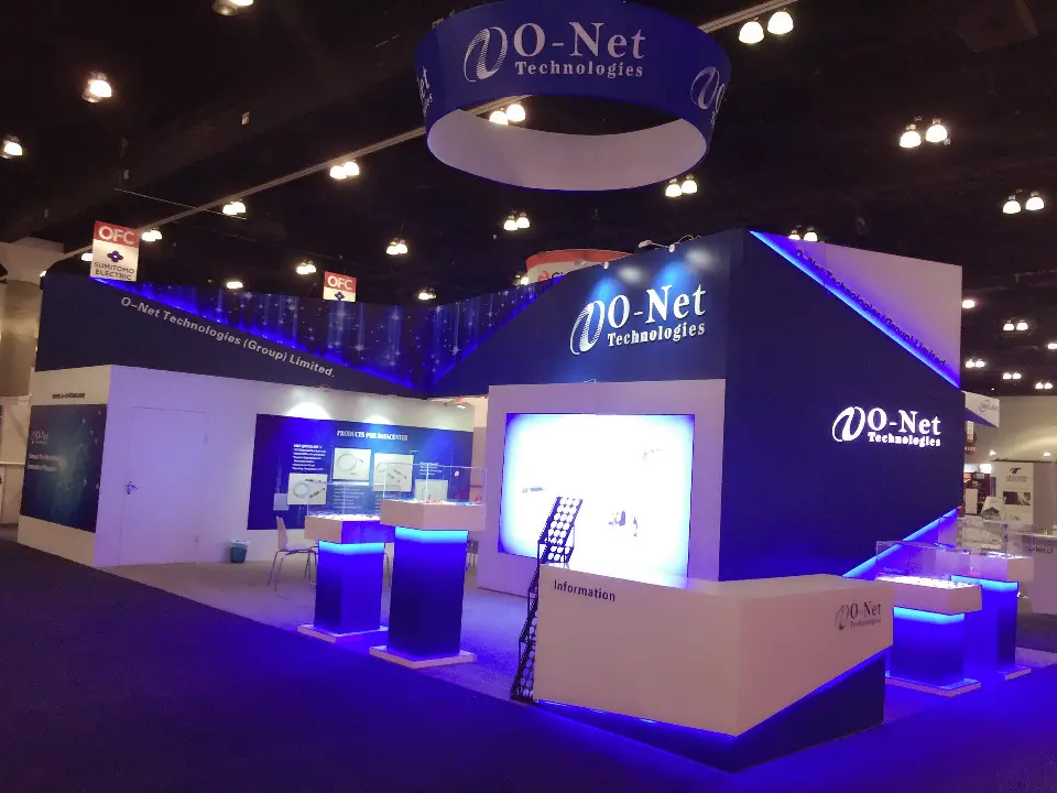 Side view of the navy block, Information counter and white walls with product panels