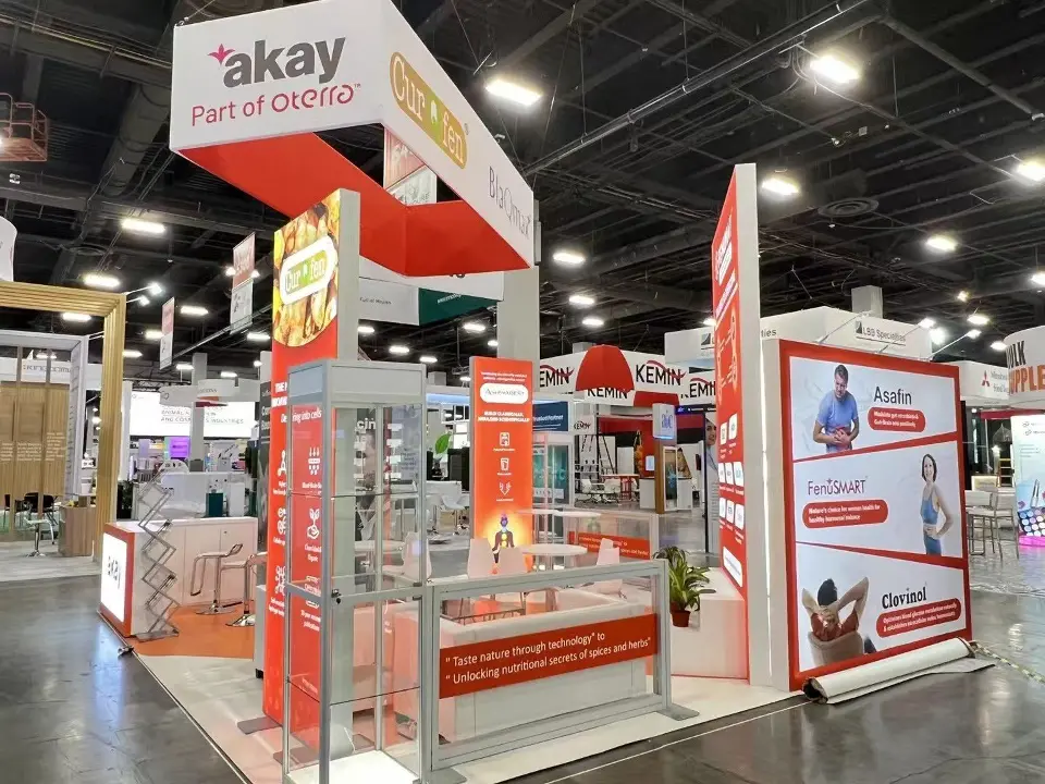 Corner view of red and white towers with akay Part of Oterra header