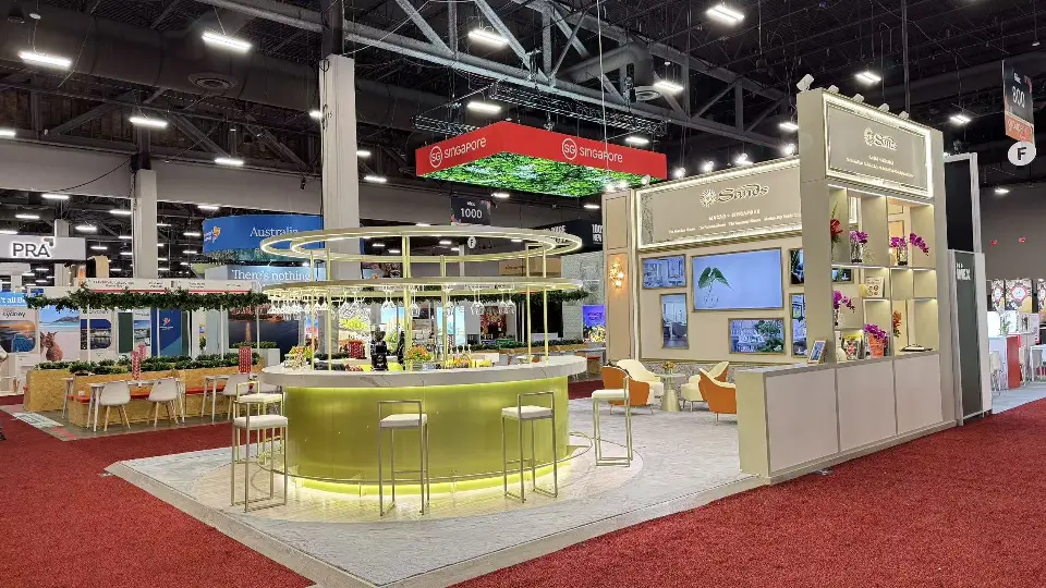 Side angle of the Sands bar with orange lounge chairs and graphic wall panels