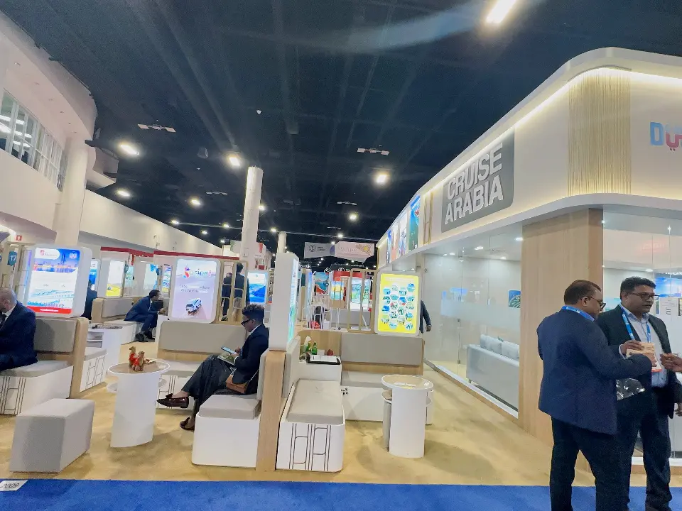 Corner of the pavilion with Cruise Arabia header and guests at the entrance