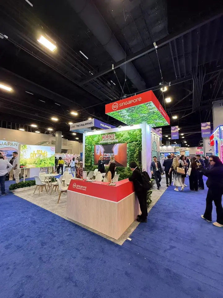 Wide view of the stand corner with counter and green canopy