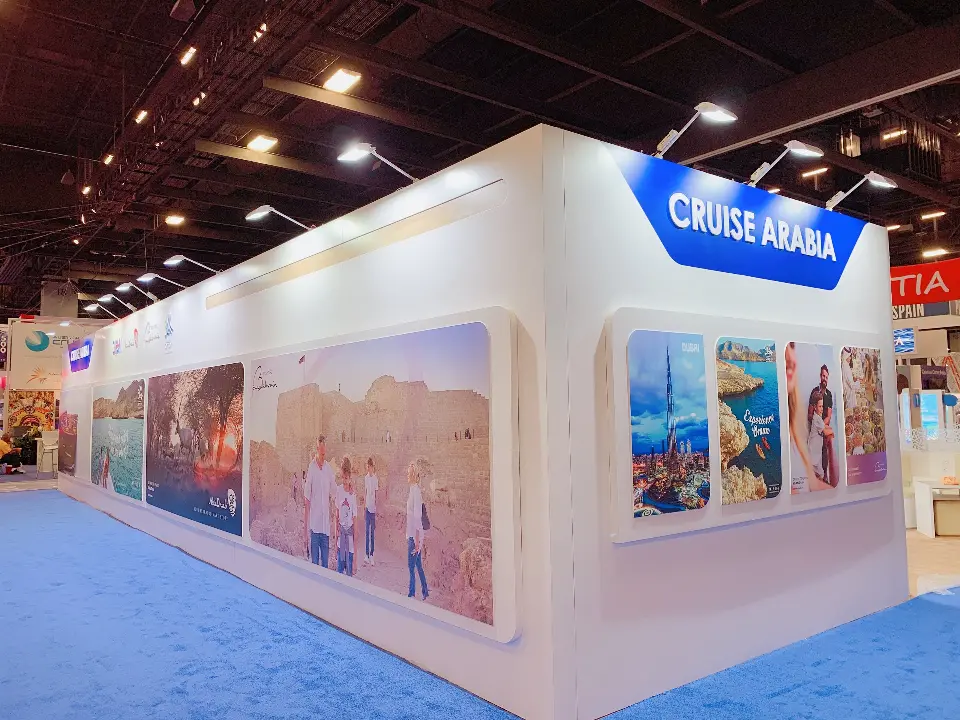 Rounded corner of the meeting room wall with header and large photo print