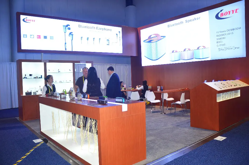Wide view of the counter and shelving with visitors browsing